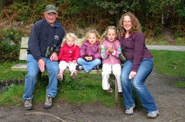 Arthur relaxing with our
                                      daughter and grandchildren.