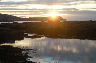 Sun setting over Treshnish
                                      headland